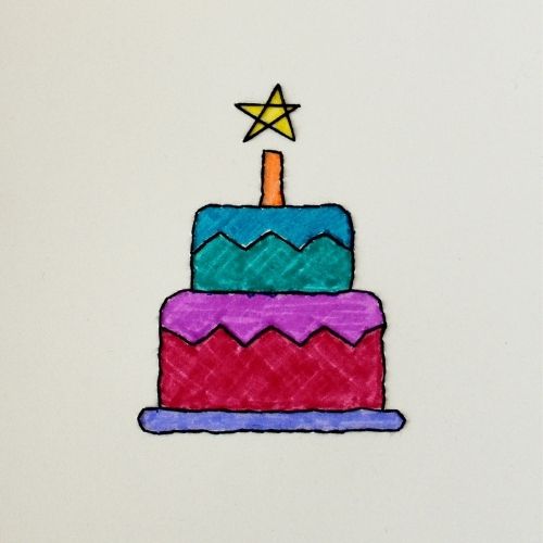 Biglietto d'auguri ricamato a mano con una torta colorata